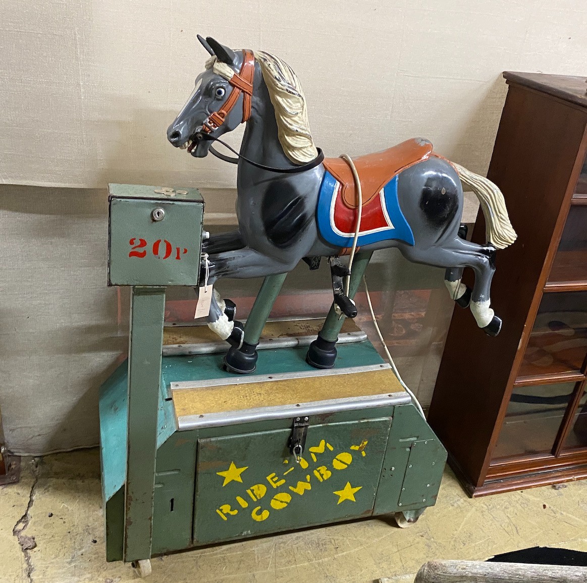 A coin operated arcade horse 'Ride 'em Cowboy' circa 1960, height 132cm